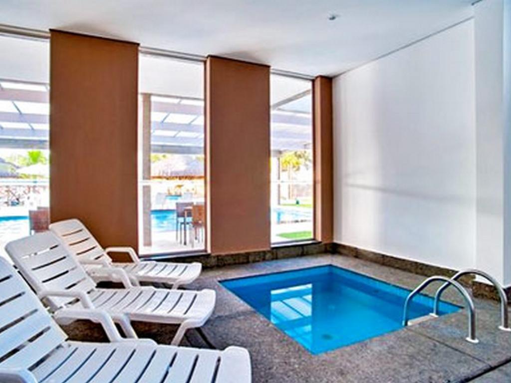 Suites Le Jardin - Caldas Novas Bilik gambar